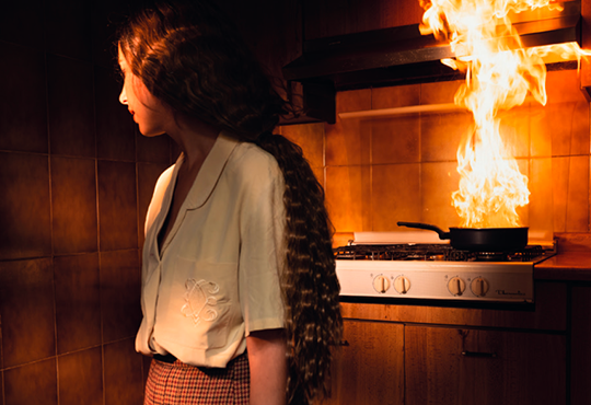 Tania Franco Klein, Pan, Fire, Kitchen (self-portrait), 2022